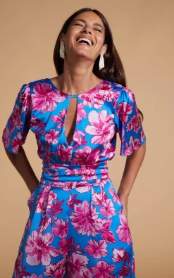 Women Dancing Leopard Savannah Jumpsuit In Pink On Blue Floral