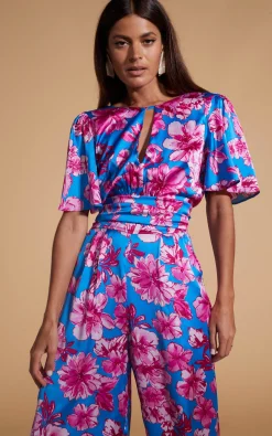 Women Dancing Leopard Savannah Jumpsuit In Pink On Blue Floral