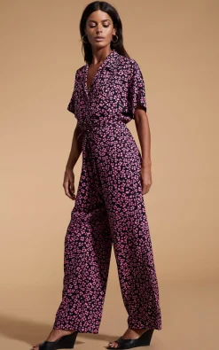 Women Dancing Leopard Zeta Jumpsuit In Pink On Black Leopard